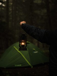 Camping lanterns light up the evening
