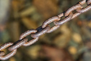 Metal camper tie down chain with rust