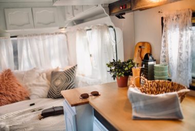 Northern lite camper interior decorated in white