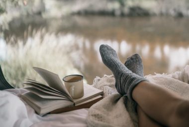 reading at her next camping adventure