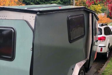 Cricket Camper towed by a small SUV