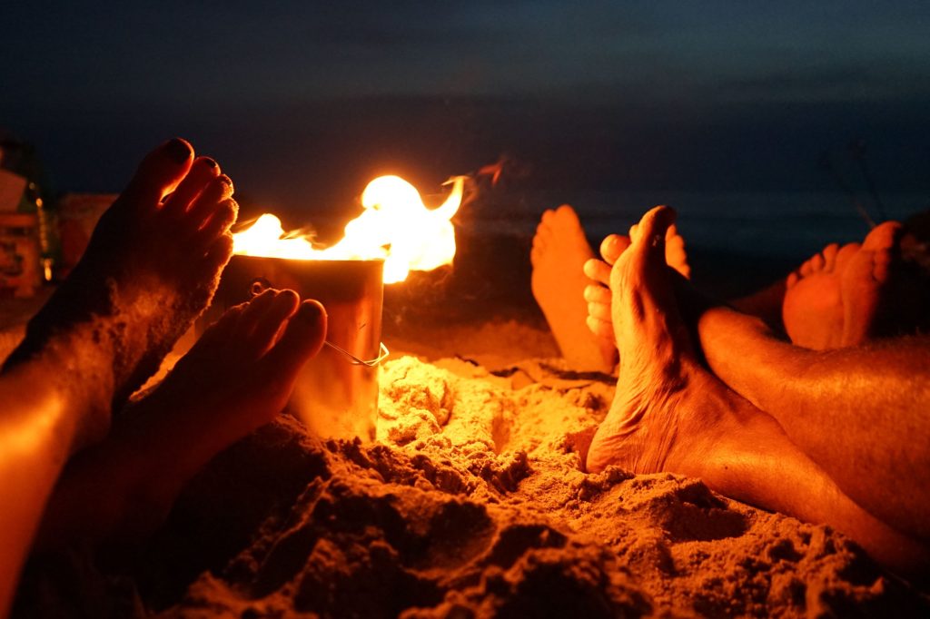 Feet warming by fire